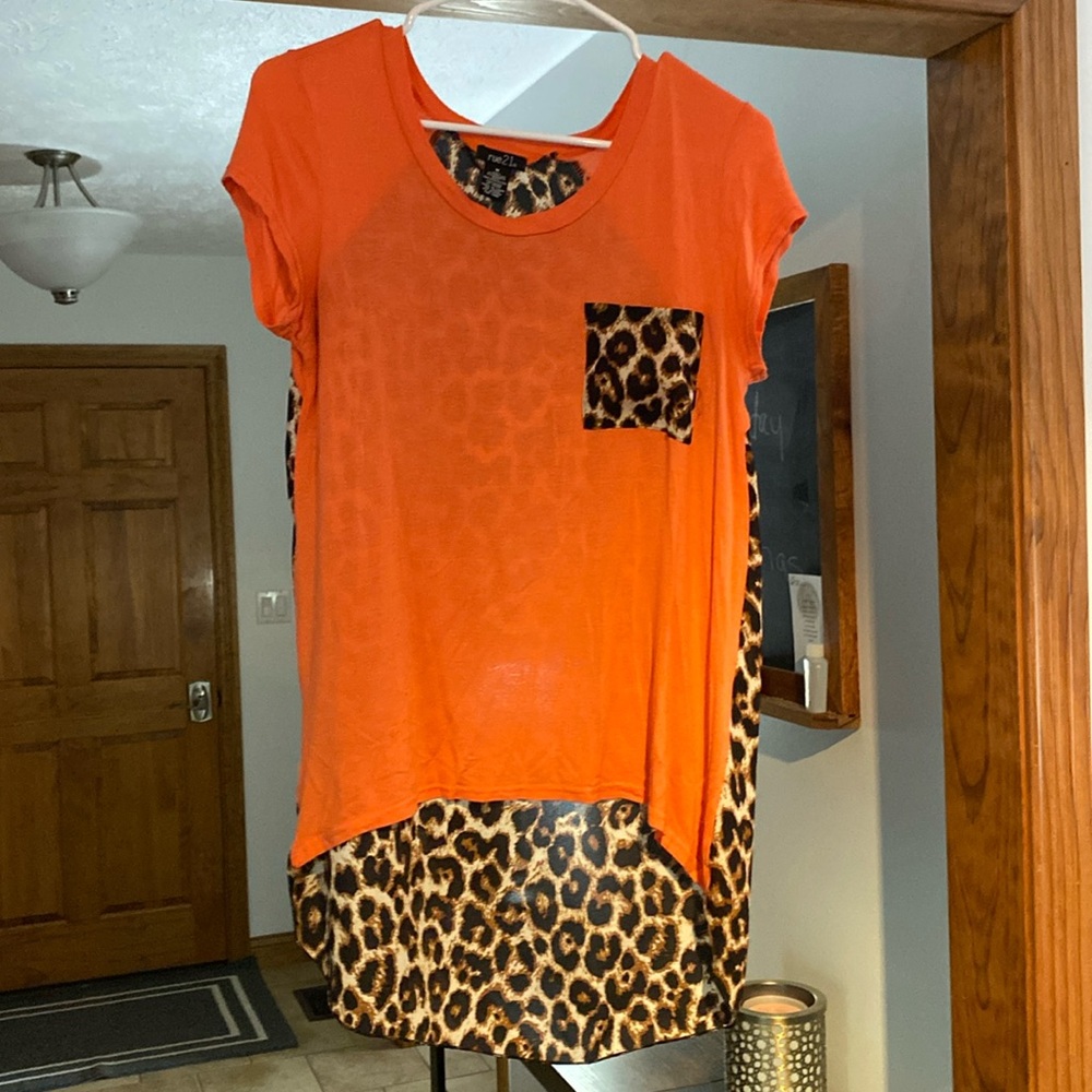 Women’s blouse light orange with lepopard print